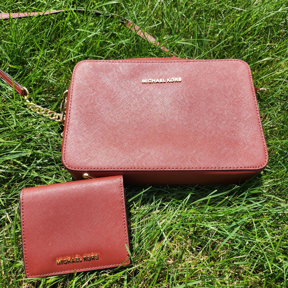 Michael Kors Burgundy/Wine Crossbody Bag and Wallet set with gold accents.